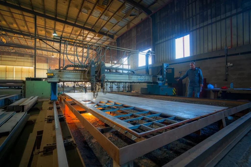 The workshop behind the work.